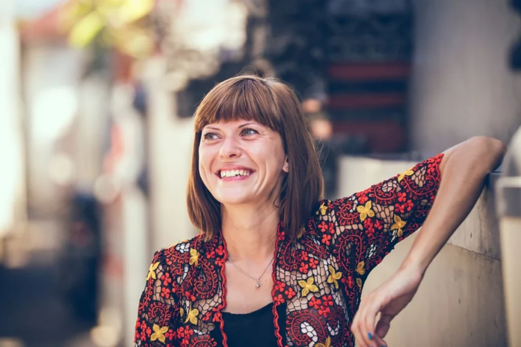 Smiling woman on a gig job in Miami.