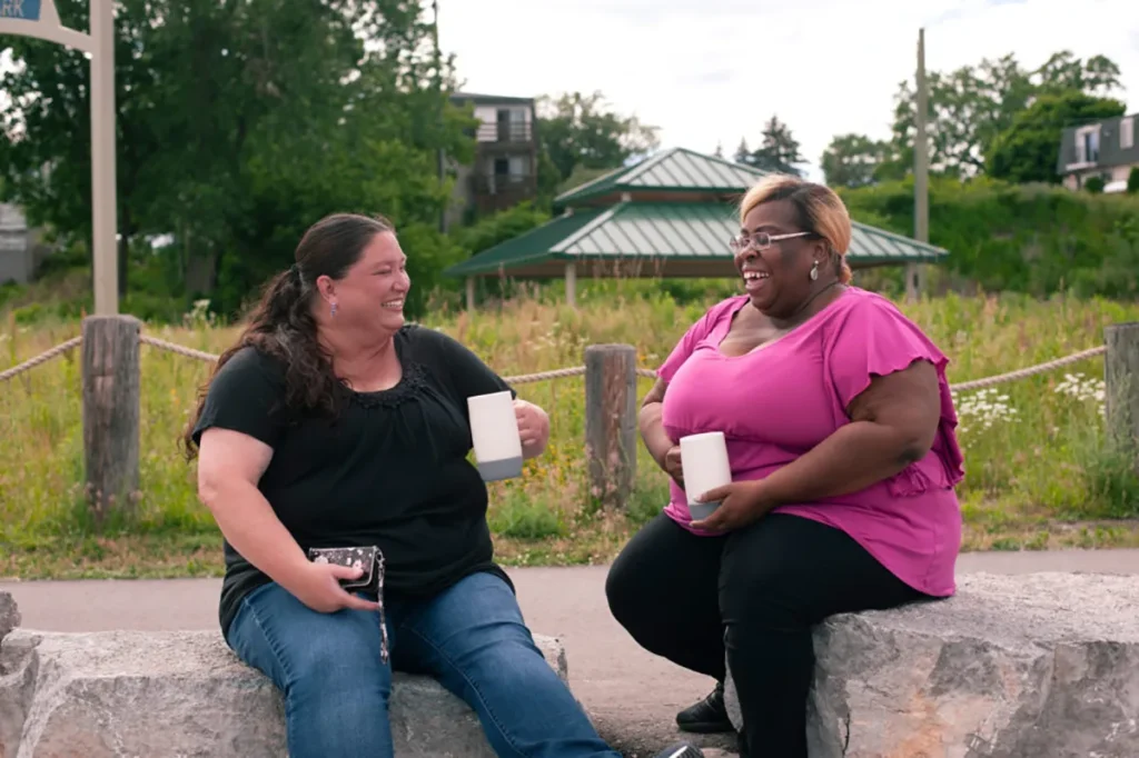 Felicia and Michelle discussing how to break the cycle of poverty.