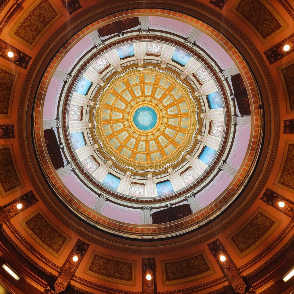 Taking a guided tour of the Michigan State Capitol Building is one of many fascinating activities for seniors in Lansing.