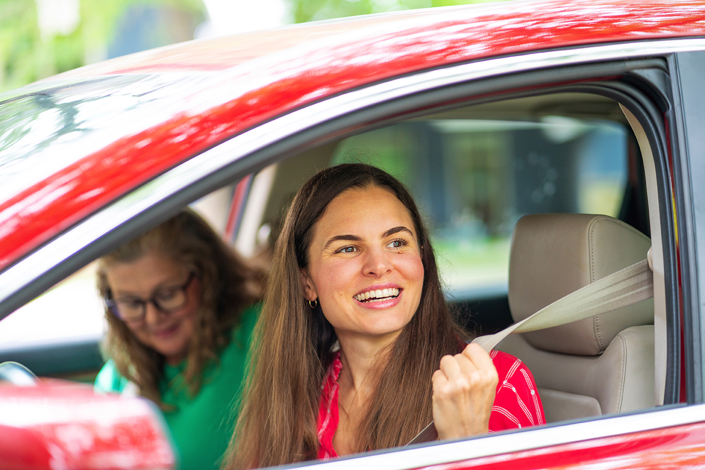 Two women in a car.