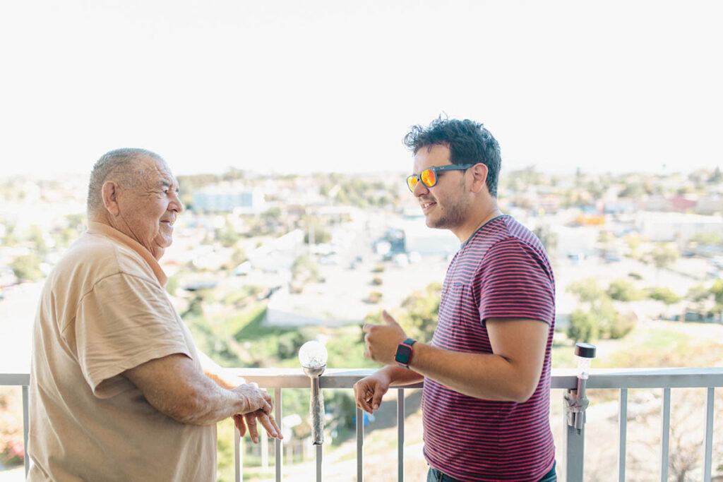 Bernie and Papa Pal Marco talking.