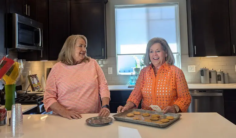 Linda and Diana baking.